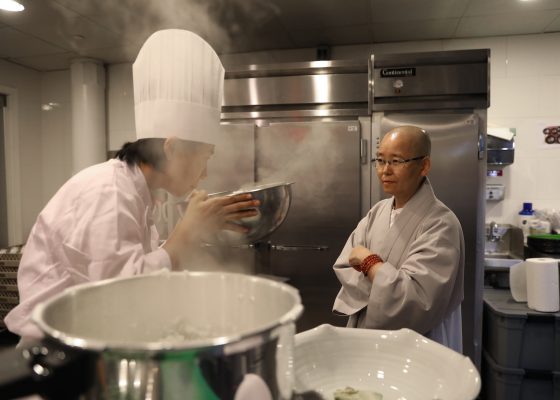 Beop Song, a Korean Buddhist nun, in the kitchen