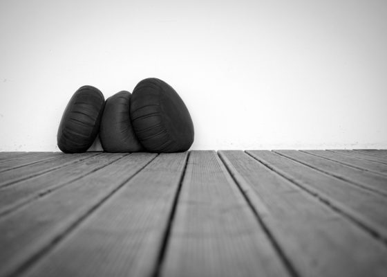 photo of cushions stacked against a wall for story on difficulty meditating